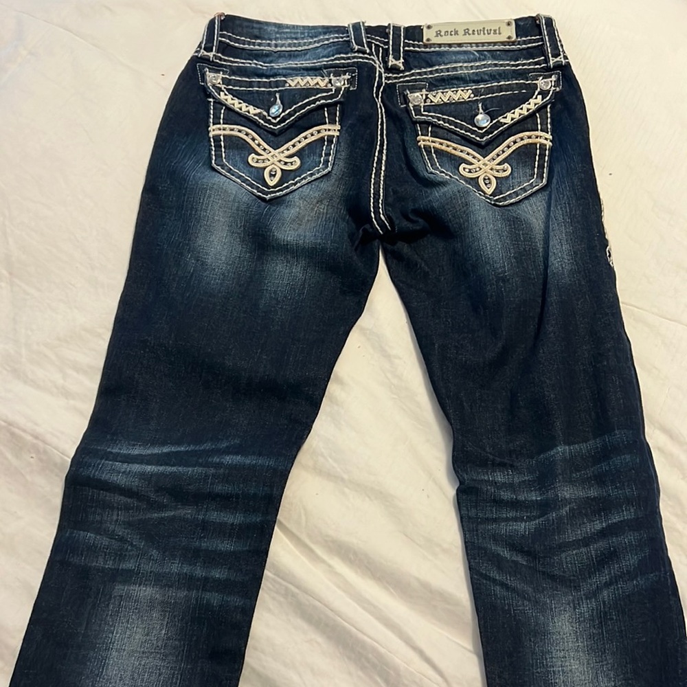 Bought at The Buckle. Worn one time Rock Revival Jeans. Size 29 length 31